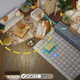A screenshot of the Sims Summit announcement shows an early Build Mode house design